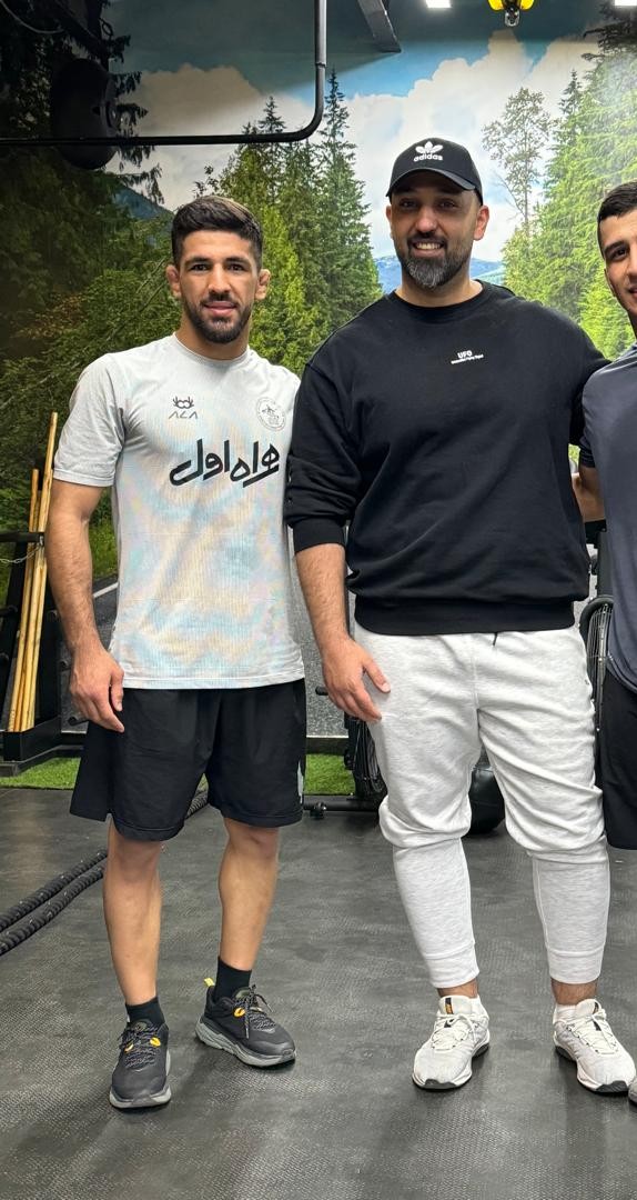 علی قلیزادگان در کنار دکتر حامد ظرافتی